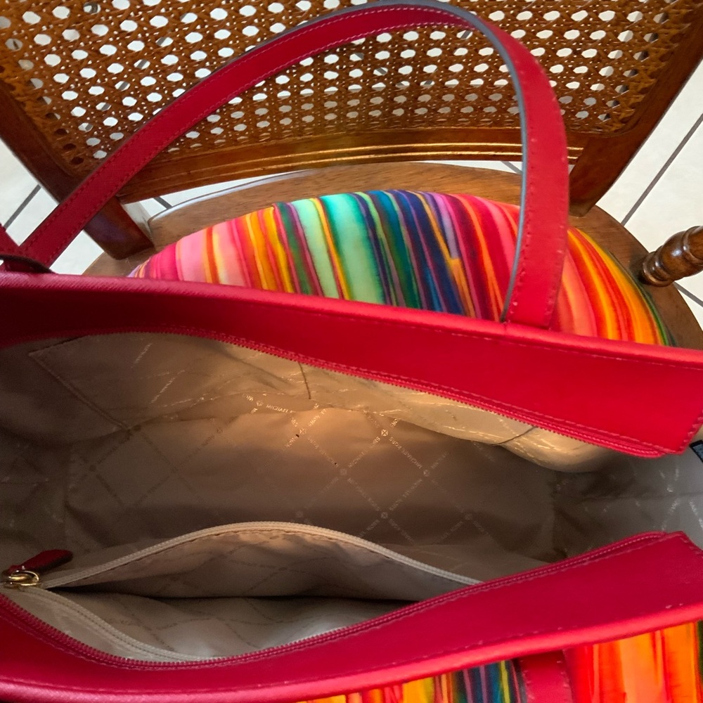 Red Michael Kors handbag